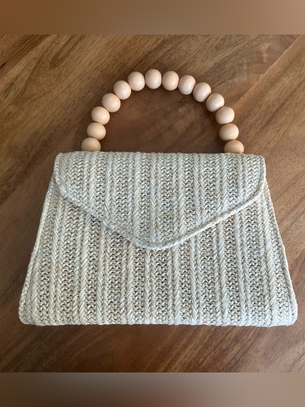 Beaded Handle Woven Straw Clutch in Natural